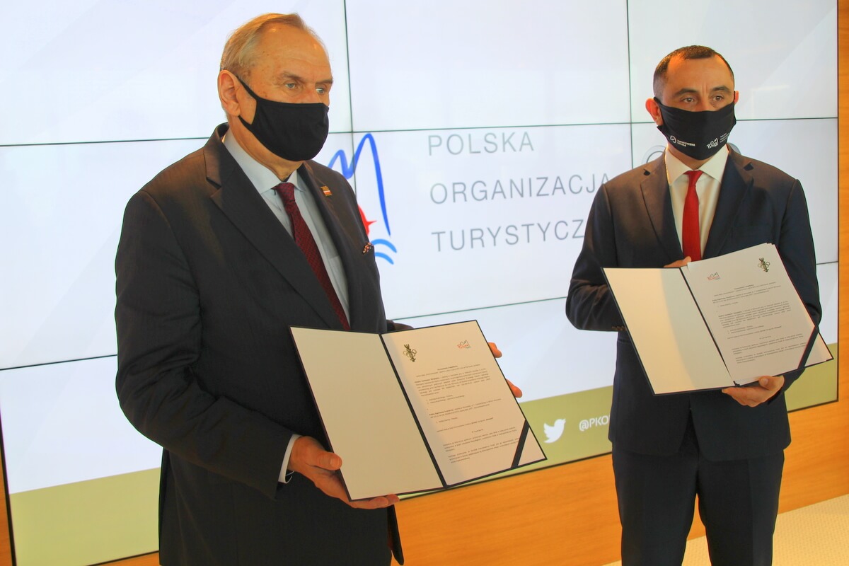 Andrzej Kraśnicki, prezes PKOl i Rafał Szlachta, prezes POT PKOl i POT sformalizowały współpracę w ramach promocji Polski