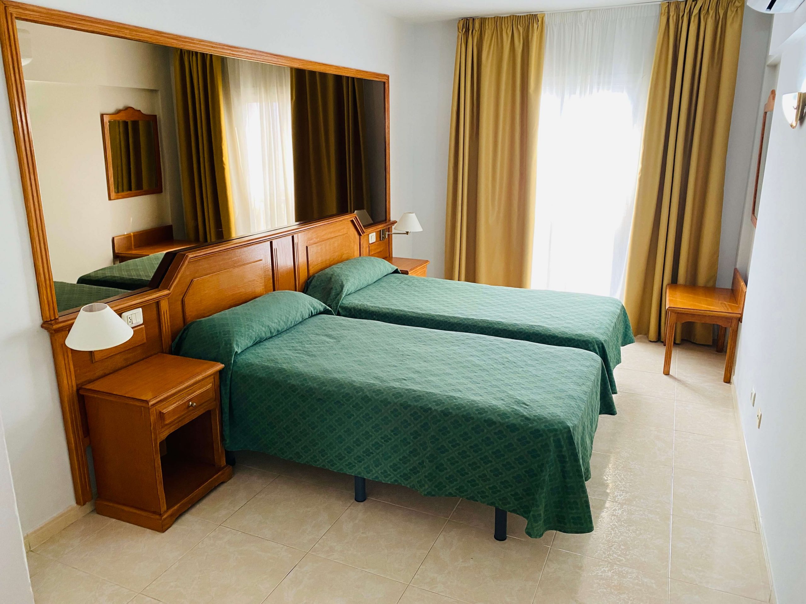 Sypialnia w apartamencie w Villa de Adeje Beach